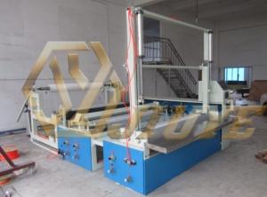 JY-F2000全自動(dòng)無紡布?xì)獾饵c(diǎn)段分切復(fù)卷機(jī)